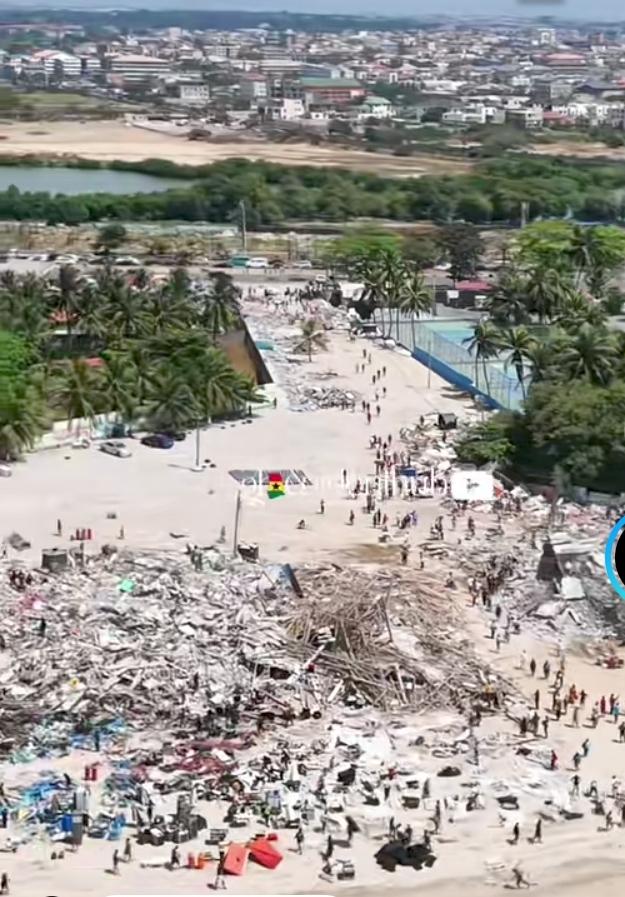 Aerial view of Labadi Beach, Accra, after the demolition of October 2026, with every structure behind the beach reduced to rubble
