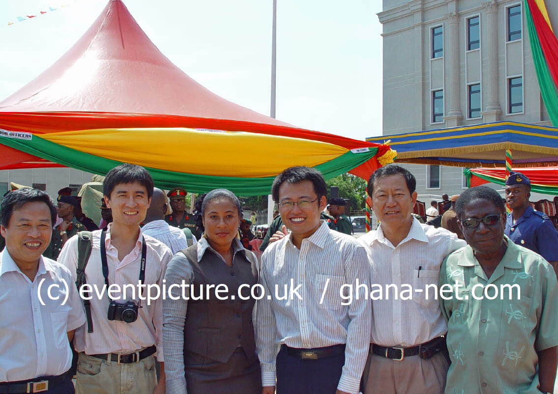 Chinese contractors posing at the Ministry of Defence building in Accra on inauguration day