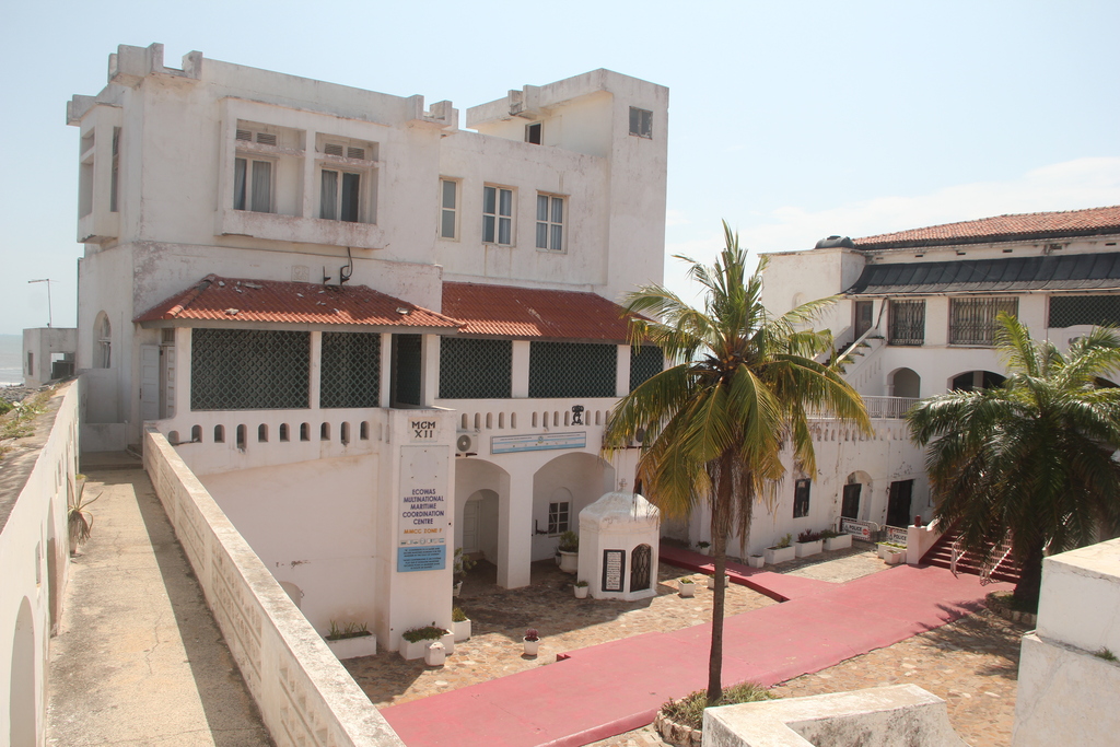Court yard and Well. Osu Castle’s architecture is a blend of European colonial design and local adaptations. The whitewashed walls, cannons, and fortified towers (c) Remo Kurka, Accra, Ghana